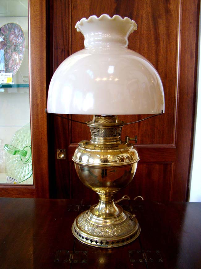 A 19th century Bradley & Hubbard oil lamp, now converted to electricity